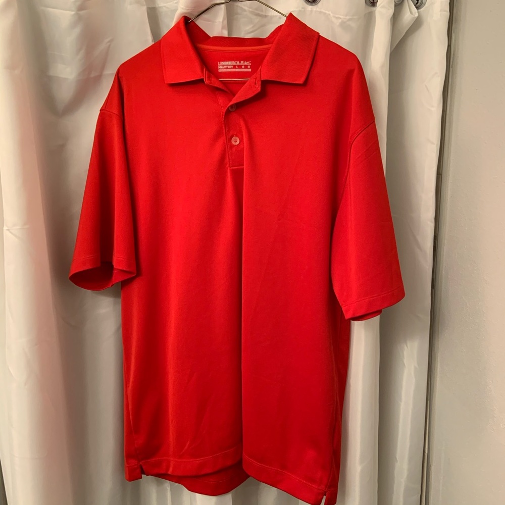 Dri-fit Nike golf shirt with collar.